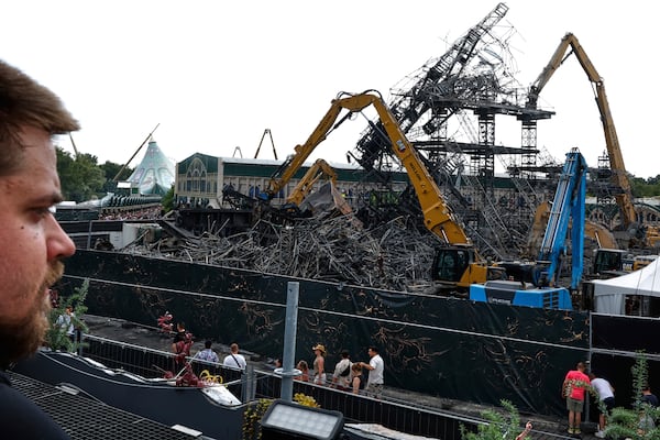 The burned main stage is seen at the Tomorrowland music festival in Boom, Belgium, Friday, July 18, 2025, two days after a huge fire destroyed the stage on Wednesday. (AP Photo/Omar Havana)