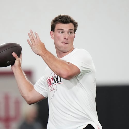 Indiana quarterback Fernando Mendoza looks to throw a pass during the school's NFL football pro day Wednesday, April 1, 2026, in Bloomington, Ind. (AP Photo/AJ Mast)