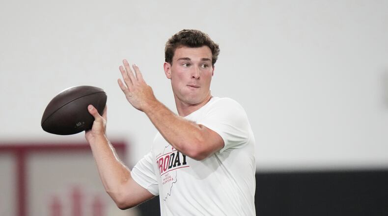 Indiana quarterback Fernando Mendoza looks to throw a pass during the school's NFL football pro day Wednesday, April 1, 2026, in Bloomington, Ind. (AP Photo/AJ Mast)