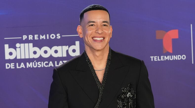 Daddy Yankee arrives at the Latin Billboard Awards Thursday, Oct. 23, 2025, in Miami. (AP Photo/Marta Lavandier)
