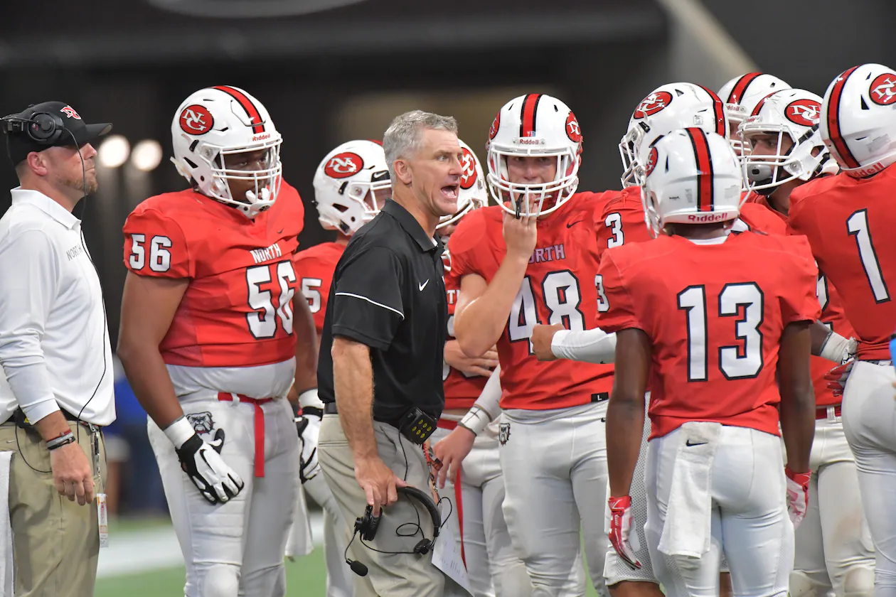 Coach Bill Stewart (center) is best known for his time at North Gwinnett, where his record was 60-19 in six seasons. (Hyosub Shin/AJC 2019)