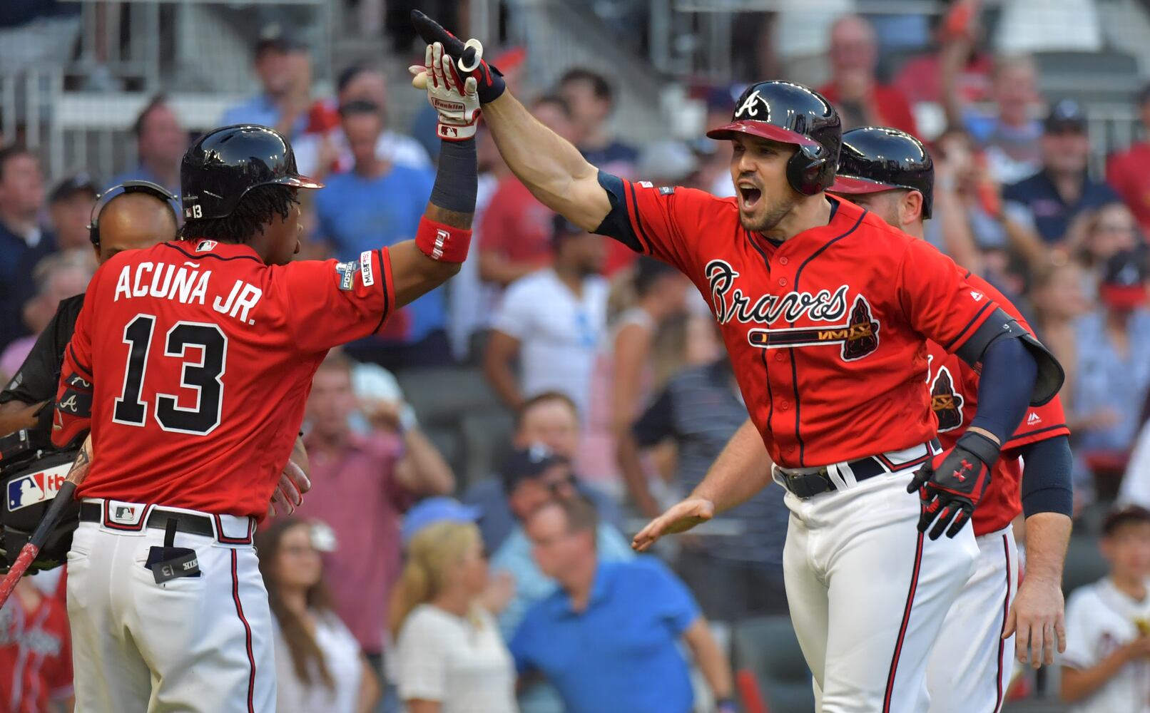 Photos: Braves bounce back, shut out Cardinals in Game 2 of playoffs