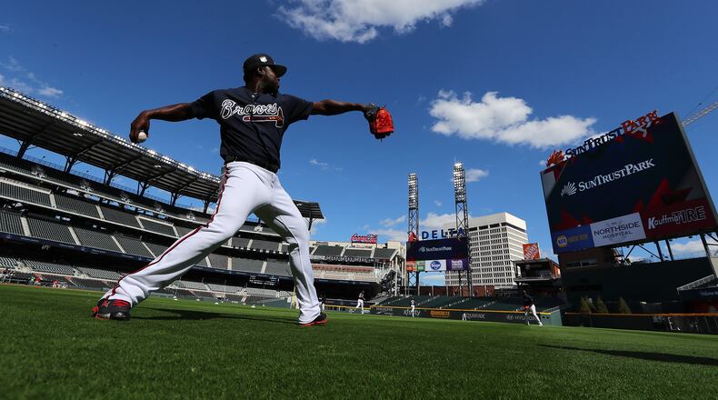 Braves pitcher Arodys Vizcaino warms up during batting practice before a MLB exhibition game against the N.Y. Yankees for the soft opening of SunTrust Park on Friday, March 31, 2017, in Atlanta. Curtis Compton/ccompton@ajc.com