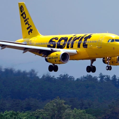 FILE - A Spirit Airlines 319 Airbus approaches Manchester Boston Regional Airport for a landing, June 2, 2023, in Manchester, N.H. (AP Photo/Charles Krupa, File)