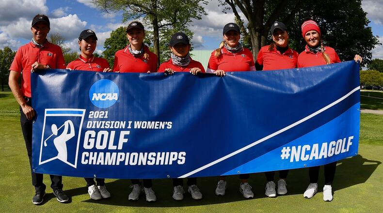 Georgia coach Josh Brewer (L) and members of the Bulldogs' women's golf team pose with the NCAA Columbus Regional banner after blowing away the field over three days win the regional at Ohio State's Scarlett Course to advance to the NCAA Championships next week in Scottsdale, Ariz. (Photo from UGA Athletics)