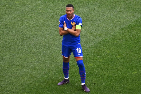 France's Kylian Mbappe celebrates after scoring the opening goal during the Nations League third place soccer match between Germany and France in Stuttgart, Germany, Sunday, June 8, 2025. (Marijan Murat/dpa via AP)