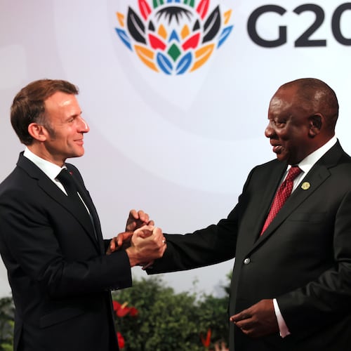 South African Cyril Ramaphosa, right, welcomes welcomes French President Emmanuel Macron, on the opening day of the G20 Summit, in Johannesburg, South Africa, Saturday, Nov. 22, 2025. (Halden Krog/Pool Photo via AP)