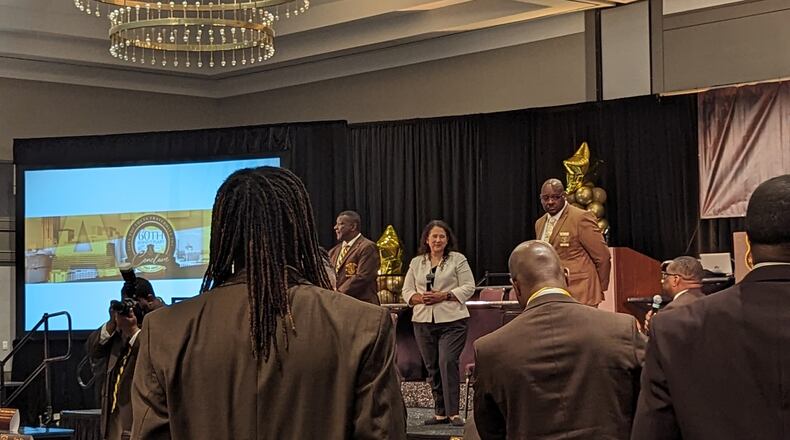 SBA Administrator Isabella Casillas Guzman (center) speaks at the 39th Biennial Conclave of the Iota Phi Theta, Inc. fraternity about the partnership between the U.S. Small Business Administration and the members of National Pan-Hellenic Council, the "Divine Nine."