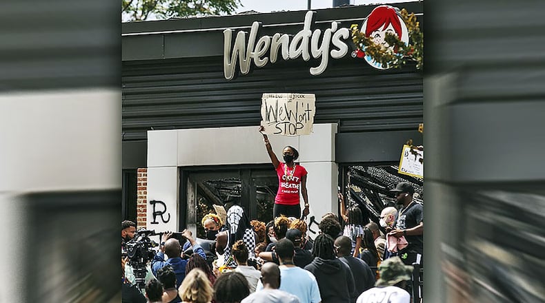 Someone set fire to the Atlanta Wendy’s where Rayshard Brooks, a 27-year-old black man, was shot and killed by Atlanta police Friday evening.