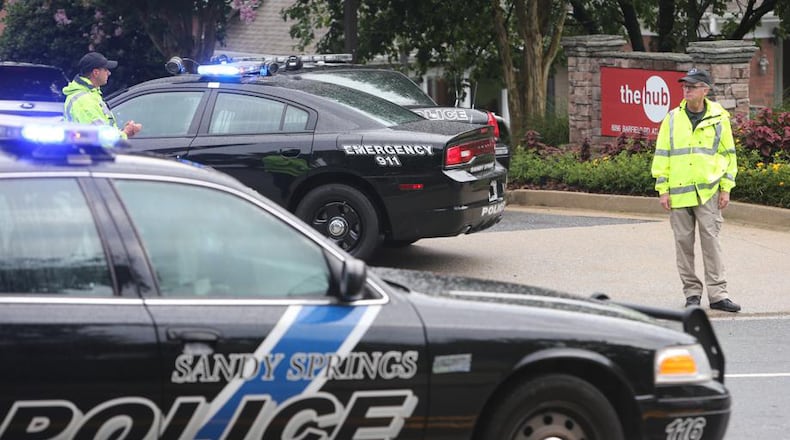 The Sandy Springs Police Department is researching best practices to ensure the safety of the person who would accompany officers responding to a 911 call and everyone involved.l. AJC FILE / BEN GRAY/BGRAY@AJC .COM
