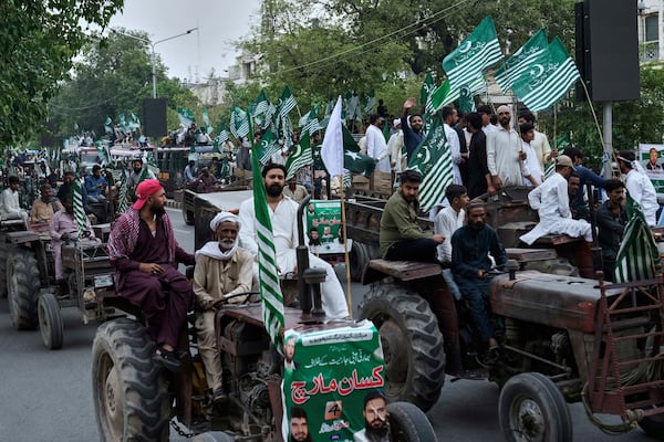 Farmers participate in a rally against the suspension of a water-sharing treaty by India, in Lahore, Pakistan, Sunday, May 4, 2025. (AP Photo/K.M. Chaudary)
