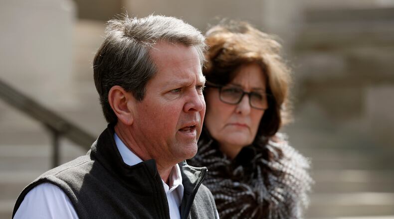 Gov. Brian Kemp prepares to set off by helicopter to Talbot County to survey storm damage.  Bob Andres / bandres@ajc.com