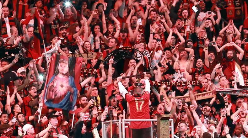 Atlanta United team owner Arthur Blank fires up the fans after hammering the golden spike as his team plays the Portland Timbers for the MLS Cup, the championship of MLS, at Mercedes-Benz Stadium in Atlanta. CURTIS COMPTON / CCOMPTON@AJC.COM