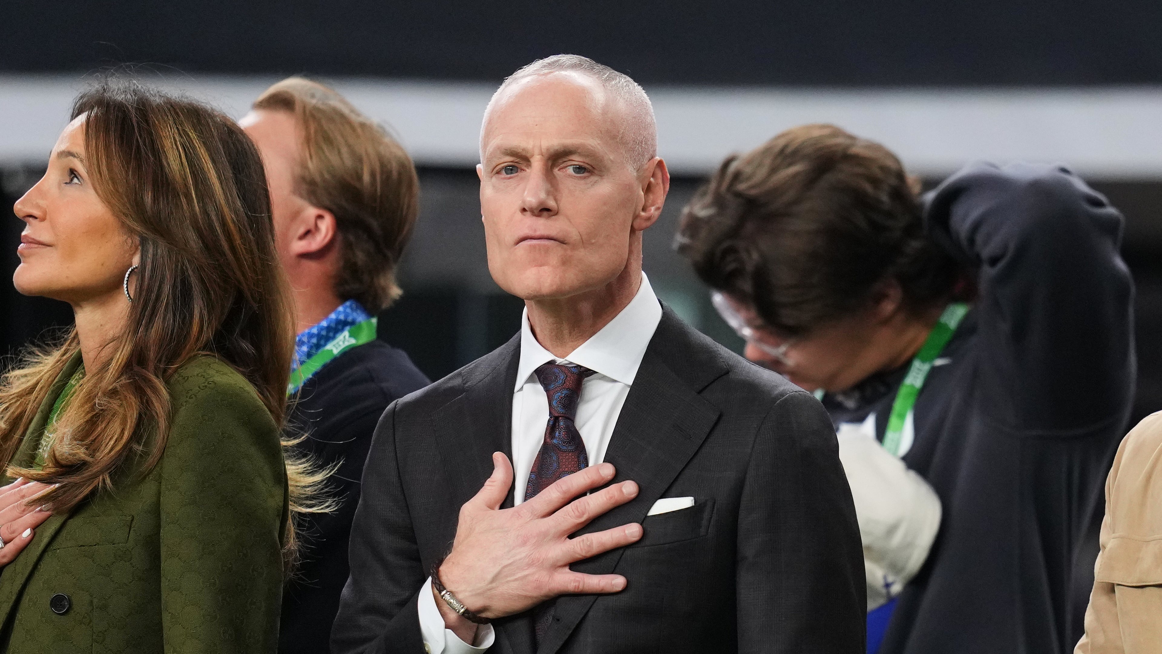 Big 12 Commissioner Brett Yormark stands on the sideline during the playing of the national anthem before the first half of a Big 12 Conference championship NCAA college football game between BYU and Texas Tech Saturday, Dec. 6, 2025, in Arlington, Texas. (AP Photo/Julio Cortez)