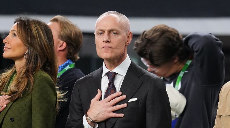 Big 12 Commissioner Brett Yormark stands on the sideline during the playing of the national anthem before the first half of a Big 12 Conference championship NCAA college football game between BYU and Texas Tech Saturday, Dec. 6, 2025, in Arlington, Texas. (AP Photo/Julio Cortez)