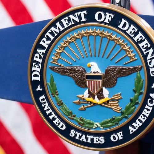 FILE - The Department of Defense seal is seen on the podium in the Press Briefing room at the Pentagon on Oct. 29, 2024, in Washington. (AP Photo/Kevin Wolf, File)