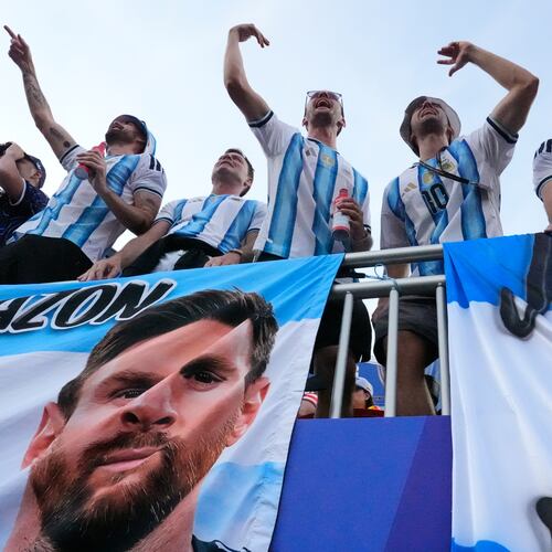 Argentinian fans react ahead of the World Cup Group J soccer match between Argentina and Algeria in Kansas City, Mo., Tuesday, June 16, 2026. (AP Photo/Charlie Riedel)