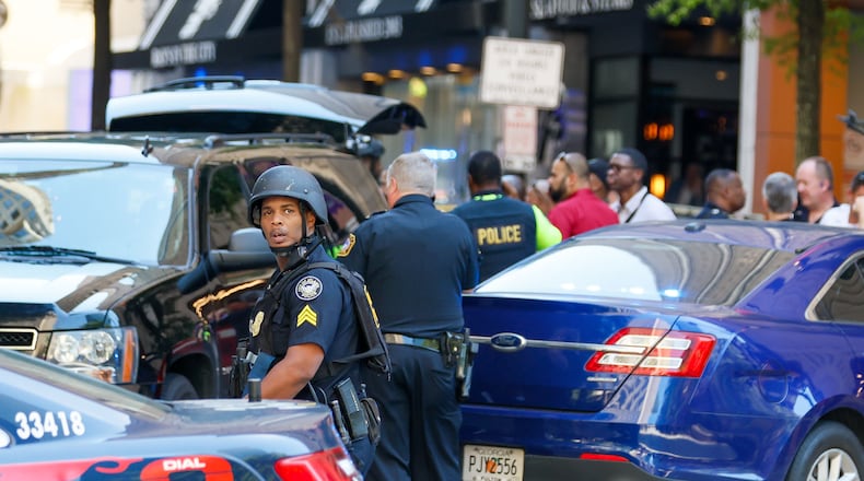 Agents with multiple agencies converge at the scene of a shooting in a busy downtown Atlanta food court at the Peachtree Center on Tuesday, June 11, 2024. One of the witnesses to the shooting later boarded a Ride Gwinnett bus and shot Ernest Byrd Jr., according to a recent lawsuit.
(Miguel Martinez/AJC)