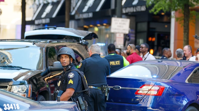 Agents with multiple agencies were at the scene where three people were injured in a June shooting in a busy downtown Atlanta food court