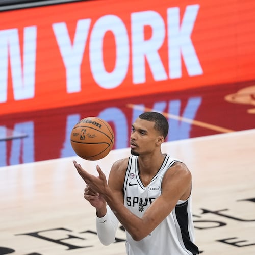 San Antonio Spurs forward Victor Wembanyama shoots a free throw during the first half of Game 2 of the NBA Finals basketball series against the New York Knicks, Friday, June 5, 2026, in San Antonio. (AP Photo/Eric Gay)