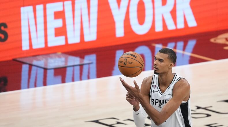 San Antonio Spurs forward Victor Wembanyama shoots a free throw during the first half of Game 2 of the NBA Finals basketball series against the New York Knicks, Friday, June 5, 2026, in San Antonio. (AP Photo/Eric Gay)