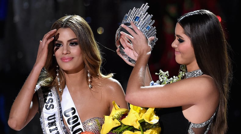 LAS VEGAS, NV - DECEMBER 20: (L-R) Miss Colombia 2015, Ariadna Gutierrez, has her crown removed by Miss Universe 2014, Paulina Vega, and given to the winner of Miss Universe 2015, Miss Phillipines 2015, Pia Alonzo Wurtzbach. Miss Colombia, Ariadna Gutierrez, was incorrectly named Miss Universe 2015 during the 2015 Miss Universe Pageant at The Axis at Planet Hollywood Resort & Casino on December 20, 2015 in Las Vegas, Nevada. (Photo by Ethan Miller/Getty Images)