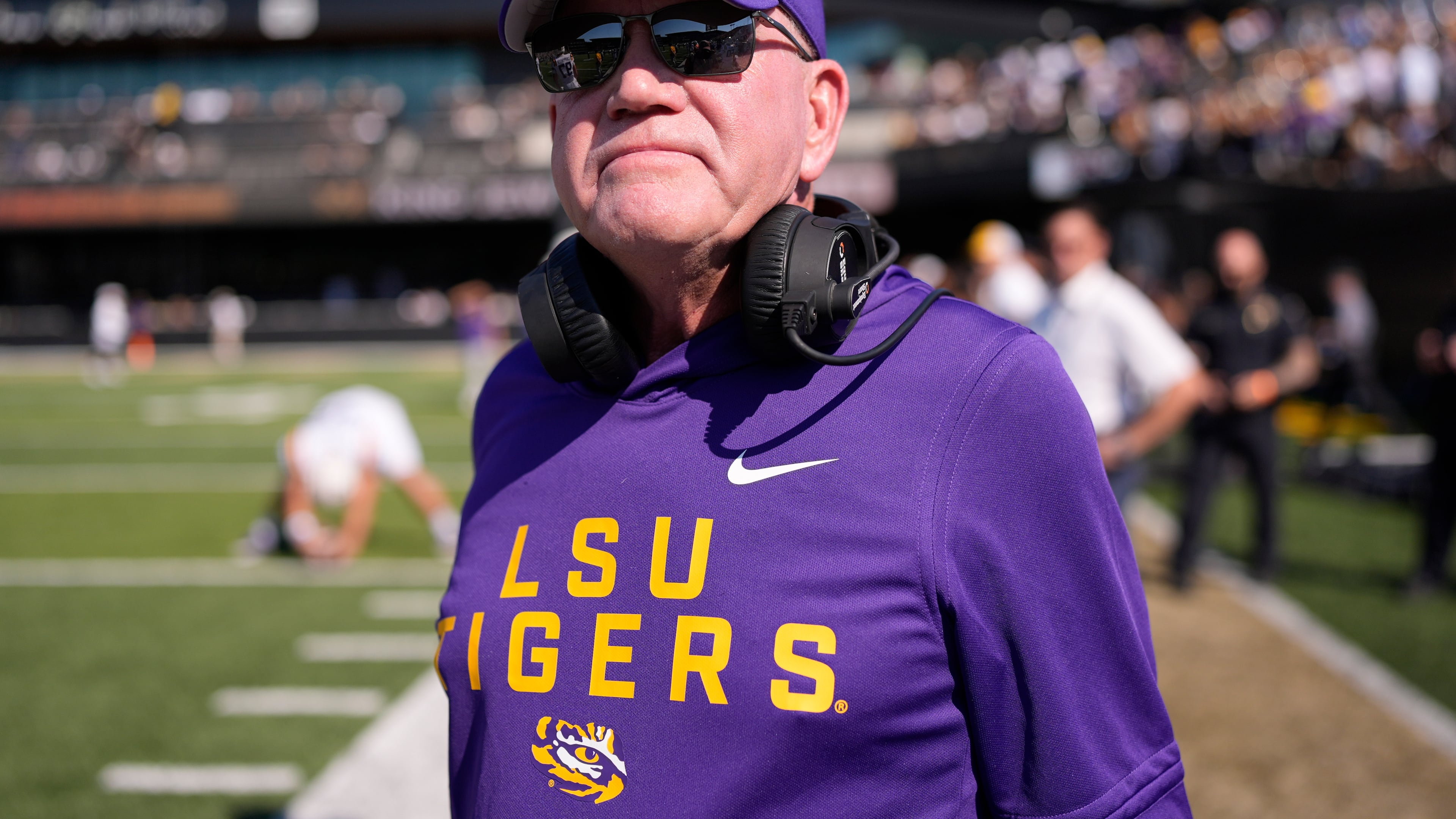 LSU head coach Brian Kelly stands on the sideline during the first half of an NCAA college football game against Vanderbilt, Saturday, Oct. 18, 2025, in Nashville, Tenn. (AP Photo/George Walker IV)