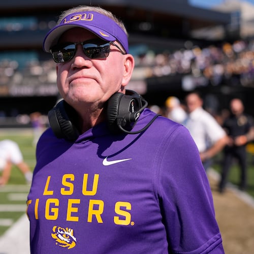 LSU head coach Brian Kelly stands on the sideline during the first half of an NCAA college football game against Vanderbilt, Saturday, Oct. 18, 2025, in Nashville, Tenn. (AP Photo/George Walker IV)