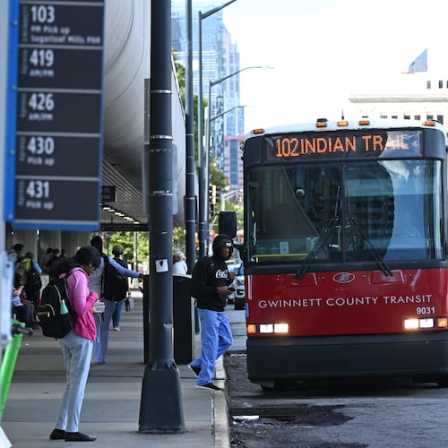 A Gwinnett County Transit bus arrives at the Civic Center MARTA station in Atlanta in 2024. (Hyosub Shin/AJC)