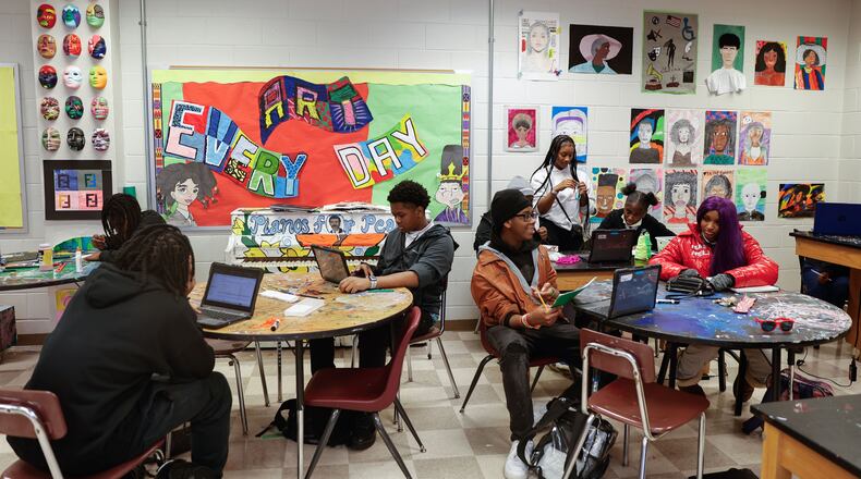 Students at Carver Early College School of Technology attend the school’s art class on Wednesday, Dec. 10, 2025. Atlanta Public Schools plans to convert the campus to a school of the arts that will serve grades 6-12. The plan depends on voters extending a one-cent sales tax for education. (Natrice Miller/AJC)