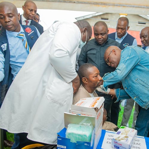 Congo’s Health Minister Roger Kamba administers an Ebola vaccine to a health care worker in Kisangani, Congo, Thursday, Aug. 27, 2026. (AP Photo/Samy Kamanga)