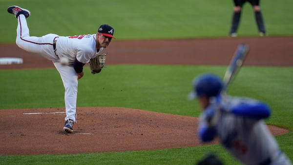 Atlanta Braves pitcher Bryce Elder (55) deleviers to Los Angeles Dodgers' Freddie Freeman in the first inning of a baseball game, Sunday, May 4, 2025, in Atlanta. (AP Photo/Mike Stewart)
