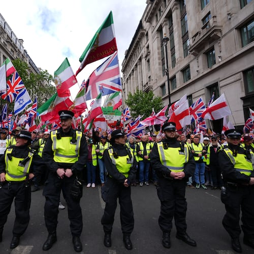 Police forces stand in front of the far right Unite the Kingdom march in London, Saturday, May 16, 2026.(AP Photo/Kirsty Wigglesworth)