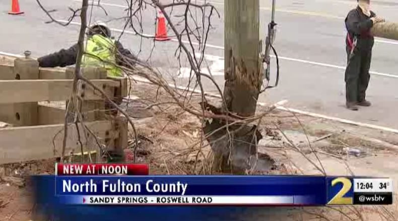 This utility pole was damaged in a deadly car crash in Sandy Springs.