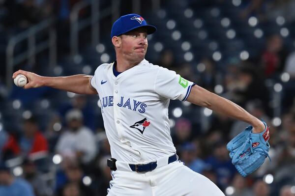 Toronto Blue Jays starting pitcher Chris Bassitt (40) throws to an Atlanta Braves batter in first inning baseball action in Toronto on Wednesday, April 16, 2025. (Jon Blacker/The Canadian Press via AP)