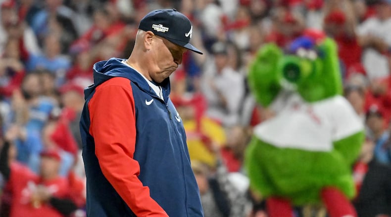 Braves manager Brian Snitker (43) walks to the pitching mound to make a change against the Philadelphia Phillies during the seventh inning of game three of the National League Division Series at Citizens Bank Park in Philadelphia on Friday, October 14, 2022. (Hyosub Shin / Hyosub.Shin@ajc.com)