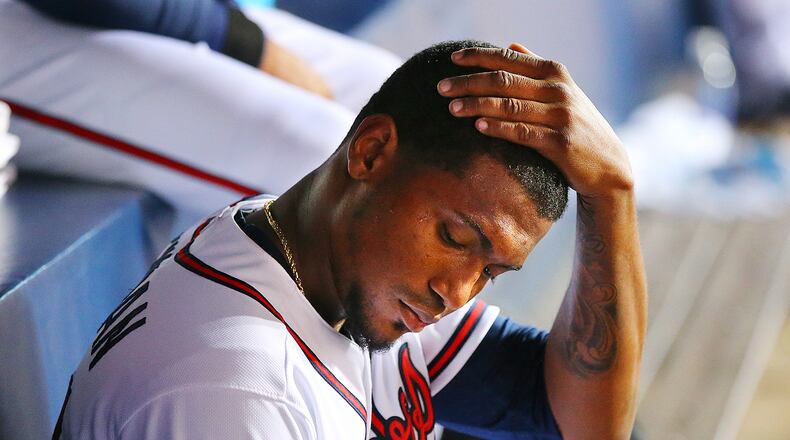 BENCHED--042815 ATLANTA: It was another rough outting for Braves pitcher Julio Teheran who sits in the dugout dejected after being pulled from the game in the 6th inning after giving up solo homer to Nationals Denard Span in a baseball game on Tuesday, April 28, 2015, in Atlanta. Teheran gave up seven runs in the game, but still left with a 10-7 lead. Curtis Compton / ccompton@ajc.com