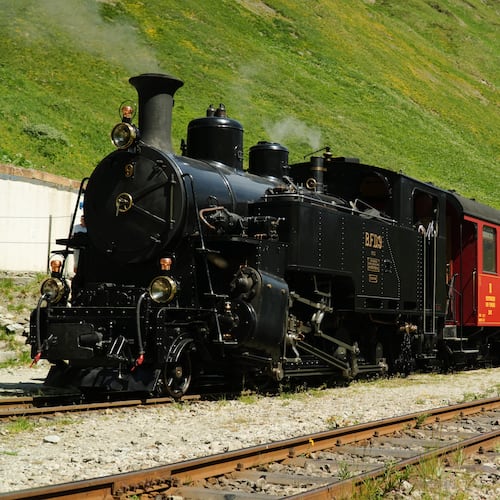 One of DFB's historic steam trains travels from Realp to Oberwald during a stop at the Furka station, Switzerland, Friday, June 26, 2026. (AP Photo/Niccolo Lupone)