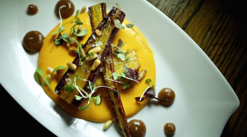 First course of Roasted Carrots, with cumin, date puree, walnuts and carrot creme is served during the Detroit Free Press Top 10 Takeover dinner series at Ale Mary's on Sept. 21, 2015 in Royal Oak, Mich. (Salwan Georges/Detroit Free Press/TNS)