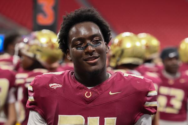 Brookwood running back Brayden Tyson reacts after scoring his third touchdown during the first half against Cambridge in the GHSA football game in the Corky Kell + Dave Hunter Classic at Mercedes-Benz Stadium, Thursday, August 13, 2026, in Atlanta. (Jason Getz/AJC)
