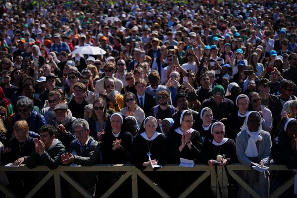 Nuns and faithful listen to mass during the funeral of Pope Francis in St. Peter's Square at the Vatican, Saturday, April 26, 2025. (AP Photo/Emilio Morenatti)