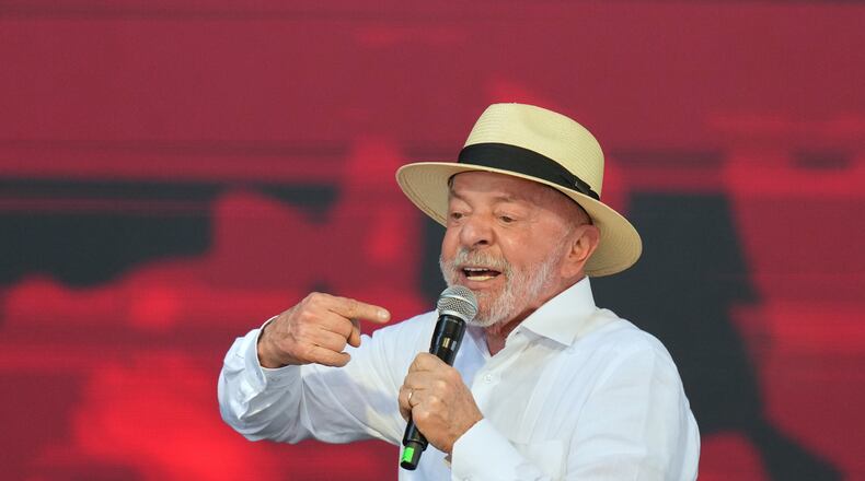 Brazilian President Luiz Inacio Lula da Silva speaks during a meeting with members of the Homeless Workers Movement marking its 30th anniversary in Taboao da Serra, greater Sao Paulo area, Brazil Saturday, Aug. 8, 2026. (AP Photo/Andre Penner)