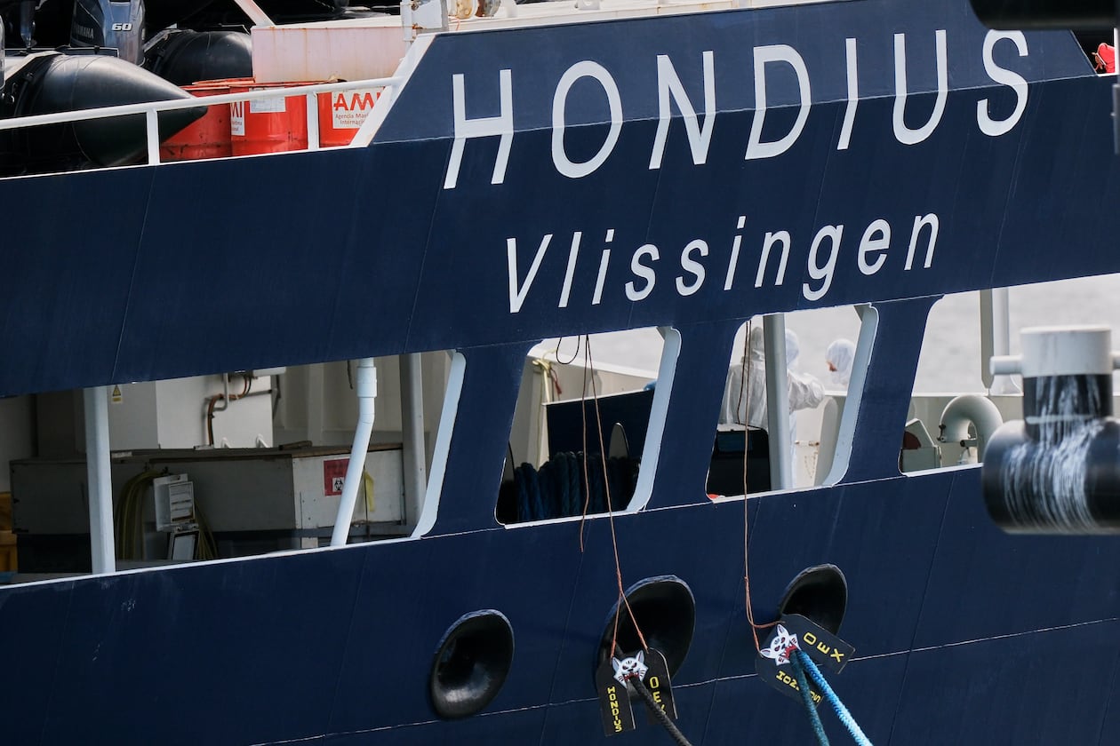 A crew in protective gear works on the MV Hondius cruise ship after its arrival at the Port of Rotterdam, Netherlands, Monday, May 18, 2026. (AP Photo/Patrick Post)