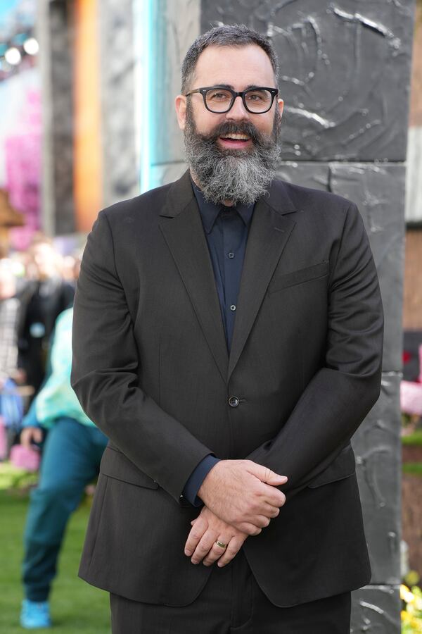 Director Jared Hess poses for photographers upon arrival at the World premiere of A Minecraft Movie on Sunday, March 30, 2025, in London. (Photo by Scott A Garfitt/Invision/AP)