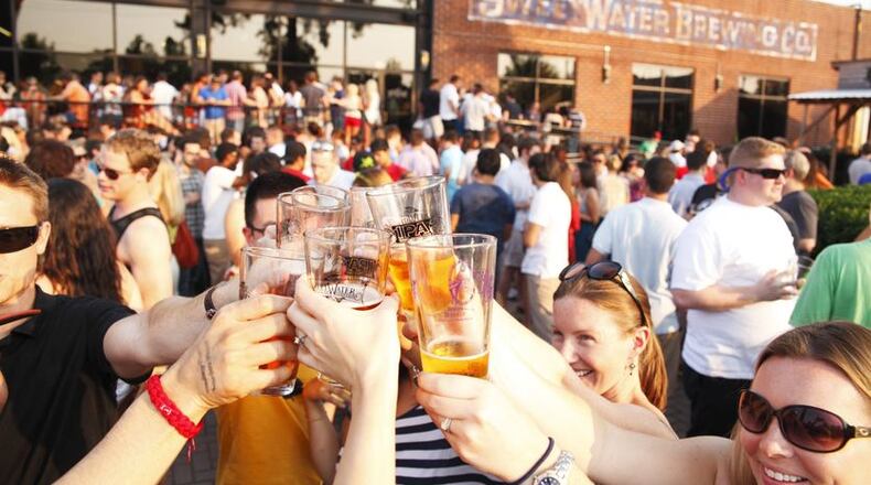 Cheers to beer at SweetWater Brewing tours and tastings, a showplace for Georgia craft beer. CONTRIBUTED BY SWEETWATER BREWING CO.