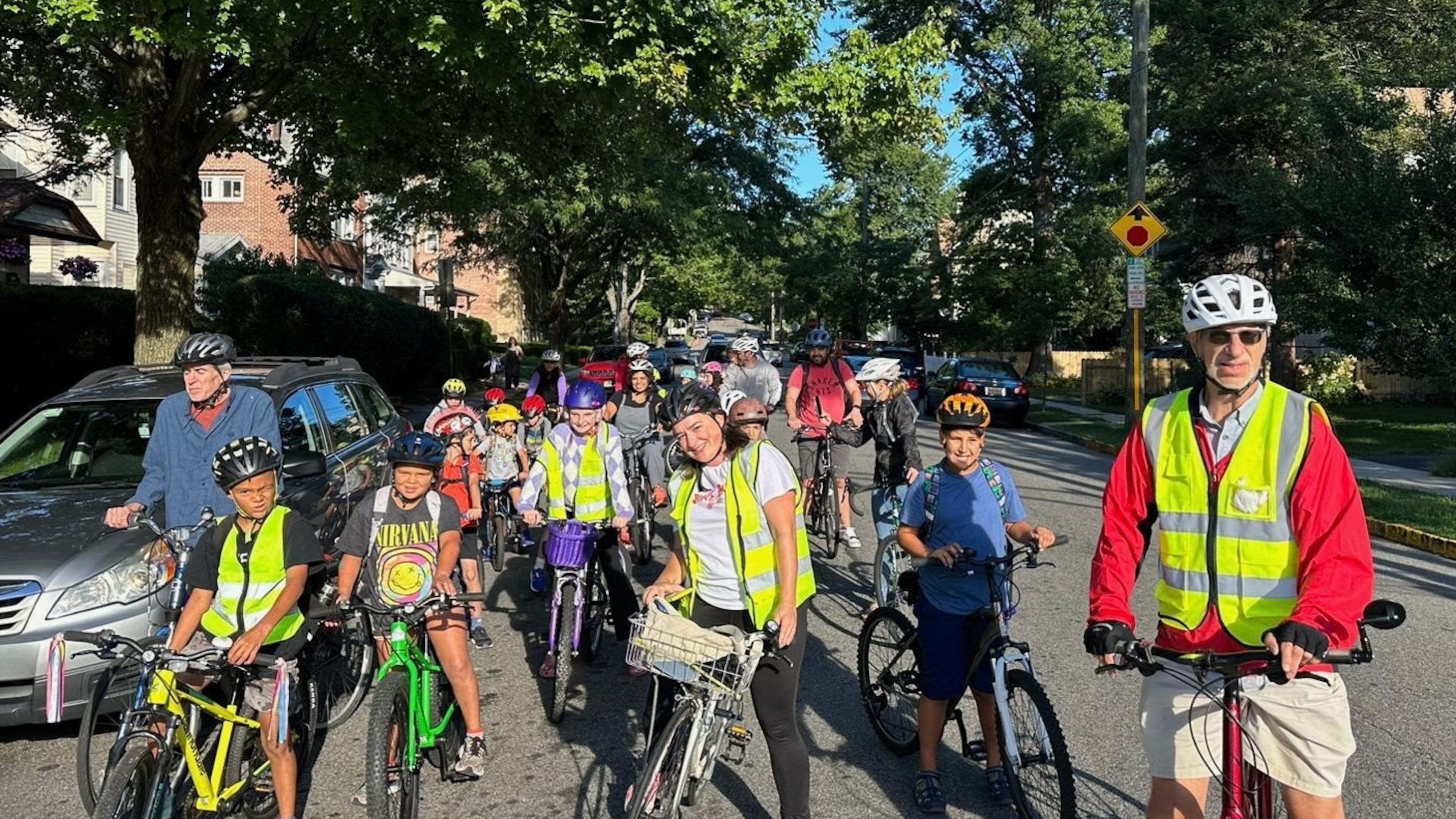 Children ride their bicycles to school during a parent-led bike ride titled "Bike Bus" Sept. 15, 2025, in Montclair, N.J. (Andrew Hawkins/Montclair Bike Bus via AP)