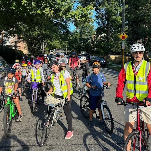 Children ride their bicycles to school during a parent-led bike ride titled "Bike Bus" Sept. 15, 2025, in Montclair, N.J. (Andrew Hawkins/Montclair Bike Bus via AP)