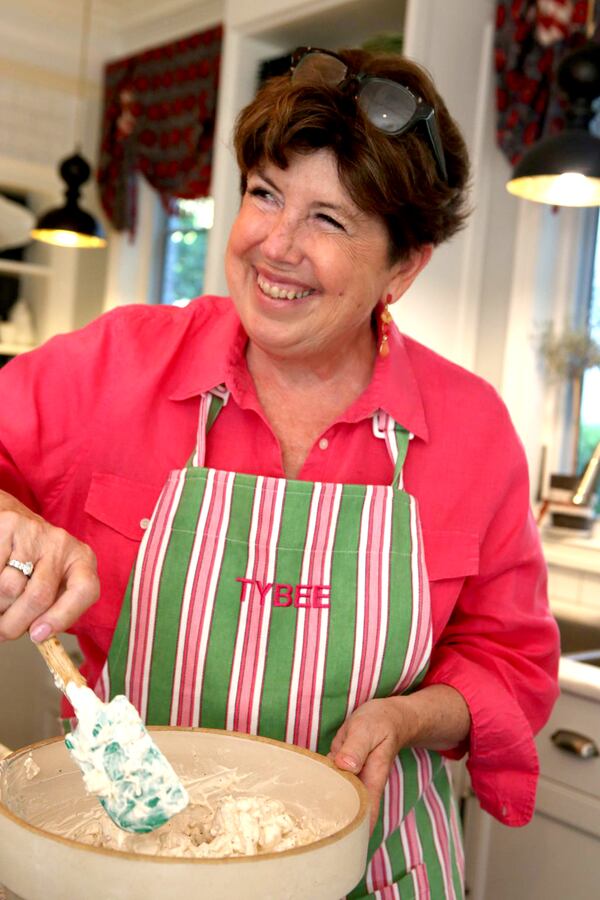 Kathy Trocheck (aka Mary Kay Andrews) prepares her Beyond the Grave Chicken Salad at her home in Avondale Estates. HENRY TAYLOR / HENRY.TAYLOR@AJC.COM