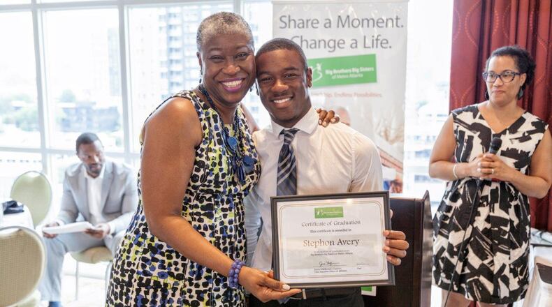 Janice McKenzie-Crayton hugs Stephon Avery, one of the “Littles” that made their way through the Big Brothers Big Sisters of Metro Atlanta. McKenzie-Crayton will be retiring as CEO at the end of this year. Photo: courtesy Big Brothers and Big Sisters of Metro Atlanta.