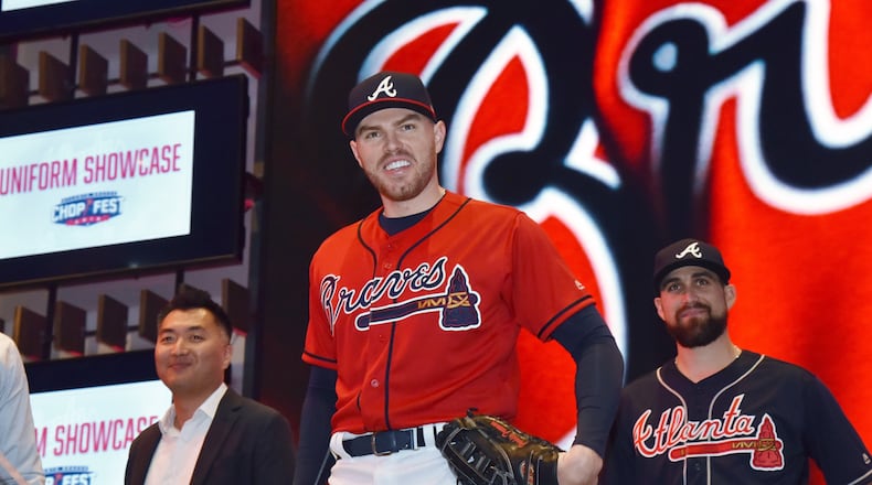 January 19, 2019 Atlanta - Atlanta Braves first baseman Freddie Freeman, wearing Home Friday Red Uniform, poses during 2019 Uniform Showcase event at LIVE! at The Battery Atlanta as a part of Atlanta Braves 2019 Chop Fest events on Saturday, January 19, 2019. The Braves' annual Chop Fest fan event was hold Saturday at SunTrust Park and The Battery Atlanta. Activities include baseball clinics, autograph sessions, photo opportunities with players, interactive attractions, live entertainment and Q&A sessions. HYOSUB SHIN / HSHIN@AJC.COM